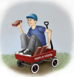 boy with bricks in wagon